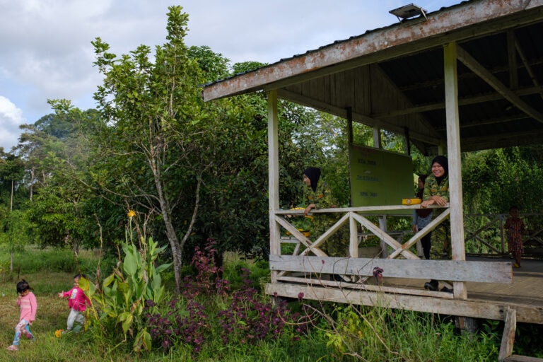 Andrapidah Putrah and other women take their turn at patrol duty. Villagers here have been more vigilant since the 2013 invasion of Lahad Datu.